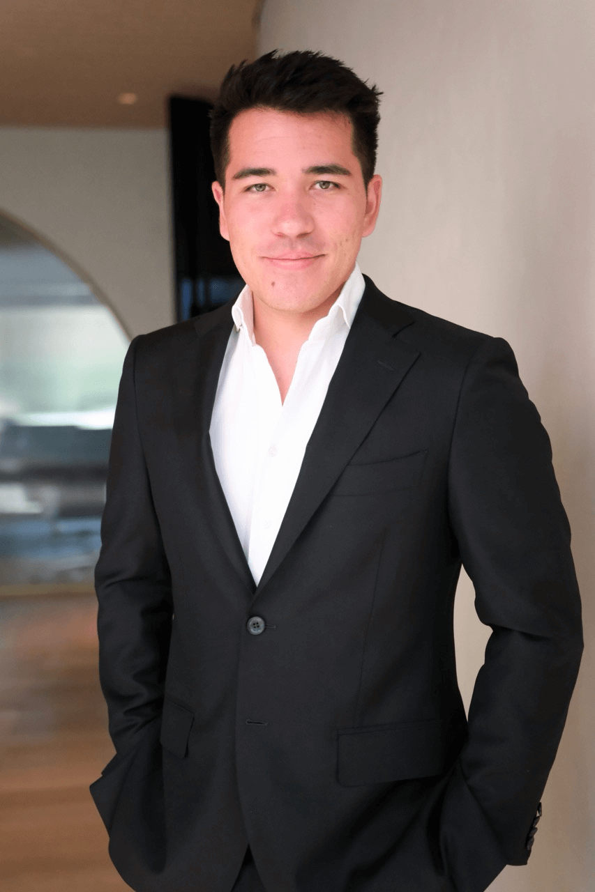 Kolin Jones the founder and CEO of Amalfi jets posed in the lobby of the Amalfi Jets Headquarters.