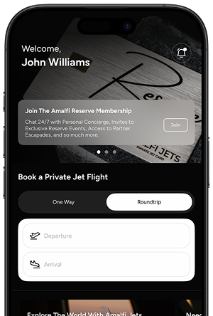 iPhone displaying the Amalfi Jets app home screen with a banner to join the Amalfi Reserve Membership and options to book private flights.